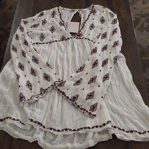 Free People- Open Back mini dress. NWT